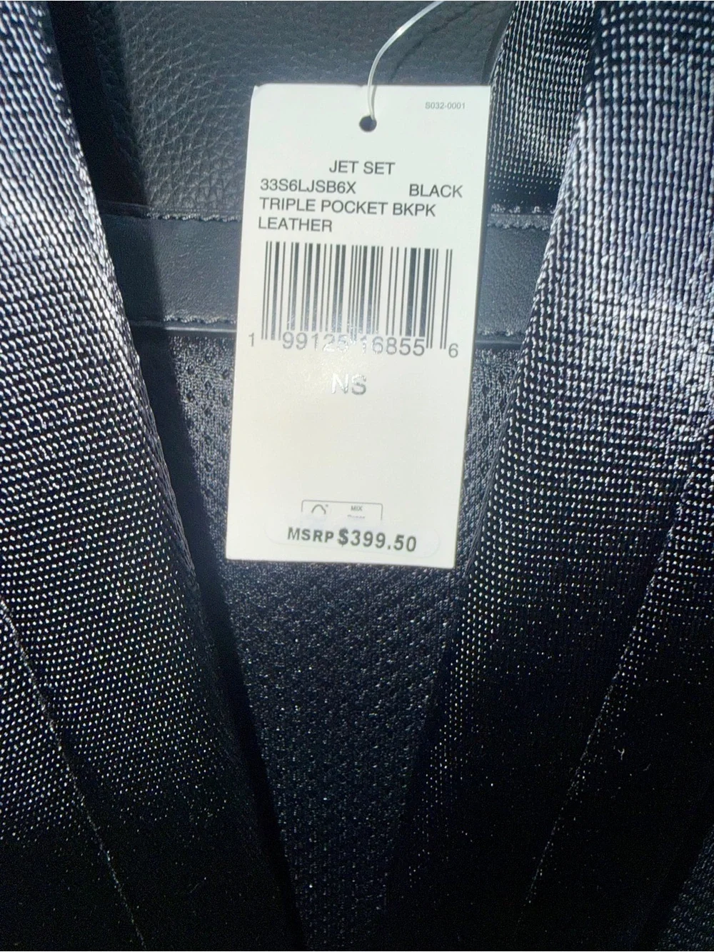 Michael Kors Black Pebbled Leather Flap Backpack